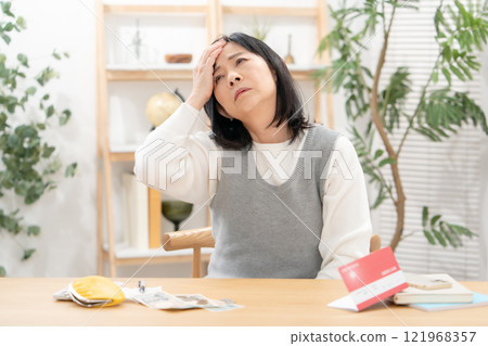 Headache, worries, hardships Headache, worries, hardships 121968357
