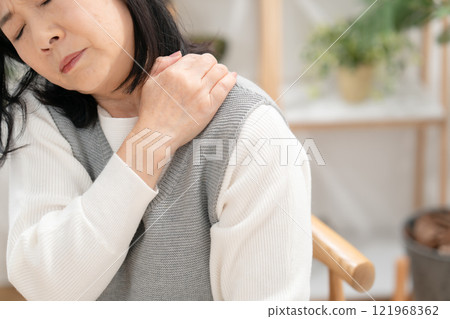Stiff shoulders, fatigue, hardships in daily life 121968362