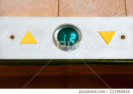 Up down.Elevator movement indicator board for floors in the building entrance Up down.Elevator movement indicator board for floors in the building entrance 121968616