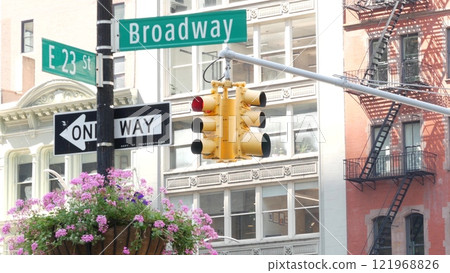 Broadway street road sign, Manhattan midtown architecture, New York City. Traffic signage of 23 st. Broadway street road sign, Manhattan midtown architecture, New York City. Traffic signage of 23 st. 121968826