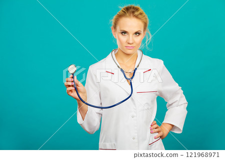 woman medical doctor with stethoscope woman medical doctor with stethoscope 121968971