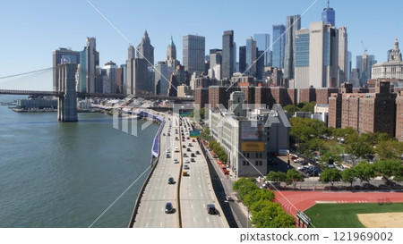 Brooklyn Bridge from Manhattan Bridge. New York City downtown skyline, financial district cityscape. Brooklyn Bridge from Manhattan Bridge. New York City downtown skyline, financial district cityscape. 121969002
