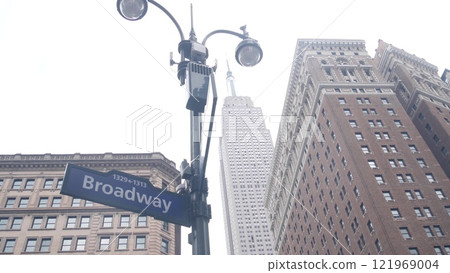 New York City crossroad, street intersection road sign. Empire State building, Midtown Broadway, 34. New York City crossroad, street intersection road sign. Empire State building, Midtown Broadway, 34. 121969004