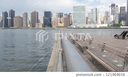 New York City waterfront skyline, Manhattan Midtown riverfront skyscrapers. Cityscape from Queens. 121969016