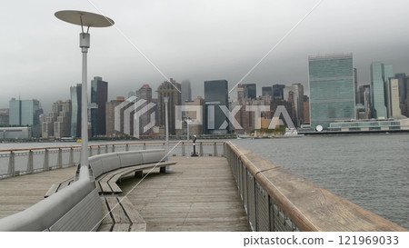 New York City waterfront skyline, Manhattan Midtown riverfront skyscrapers. Cityscape from Queens. New York City waterfront skyline, Manhattan Midtown riverfront skyscrapers. Cityscape from Queens. 121969033