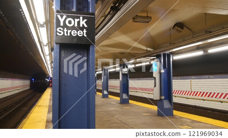 New York subway station, underground metropolitan platform sign. Metro railway passenger transport. 121969034
