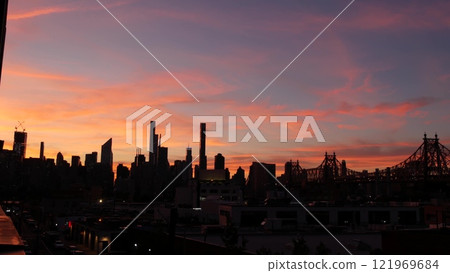 New York City Manhattan skyline cityscape. Rooftop in Queens, Midtown, Queensboro Bridge. Sunset sky 121969684