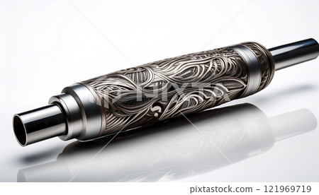 A silver object with a design of flowers and leaves 121969719