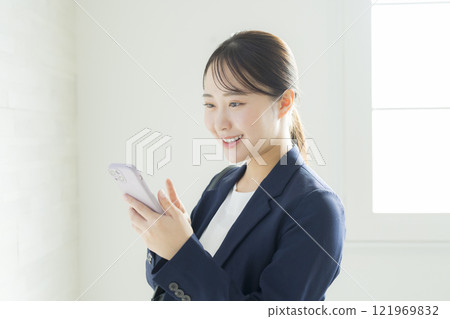 Businesswoman making arms Businesswoman making arms 121969832