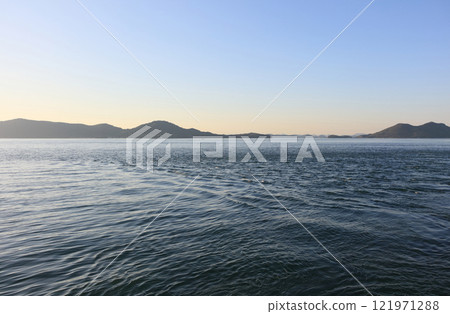 The strong currents seen from Nagasaki-no-hana at the tip of Yashima (Megijima Island is on the left and Ogijima Island is on the right in the distance) The strong currents seen from Nagasaki-no-hana at the tip of Yashima (Megijima Island is on the left and Ogijima Island is on the right in the distance) 121971288