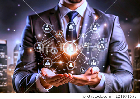 A businessman with a devise, with ideas, proposals,communications 121971553