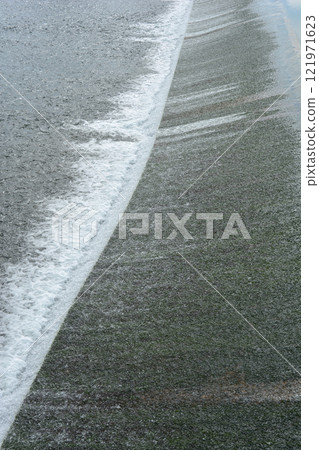 Flowing water 121971623