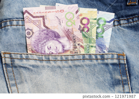 Turkmen Manat in the pocket of blue jeans Turkmen Manat in the pocket of blue jeans 121971987