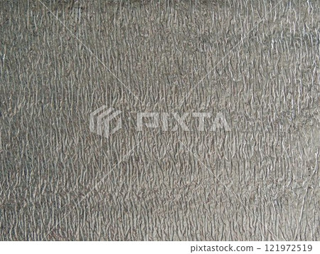 foil soft material for food packaging application or heat preservation and light reflection, silver textured background of aluminum material with ribbed surface foil soft material for food packaging application or heat preservation and light reflection, silver textured background of aluminum material with ribbed surface 121972519
