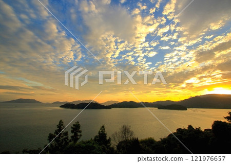 View of the Tobishima Kaido from Oshiba Island at dusk View of the Tobishima Kaido from Oshiba Island at dusk 121976657