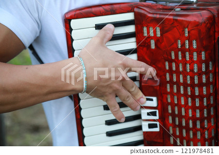 Technique And Ability Of A Professional Accordion Player  121978481