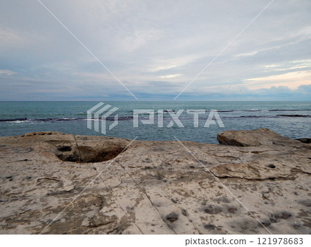 Rocky shore of the Caspian Sea. Rocky shore of the Caspian Sea. 121978683