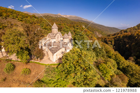 Aerial view of Medieval Haghartsin monastery complex 11th century on sunny summer day. Ancient church popular touristic destinations. Armenian attractions near Dilijan. Tavush Province, Armenia Europe 121978988