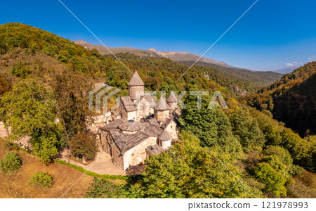 Aerial view of Medieval Haghartsin monastery complex 11th century on sunny summer day. Ancient church popular touristic destinations. Armenian attractions near Dilijan. Tavush Province, Armenia Europe Aerial view of Medieval Haghartsin monastery complex 11th century on sunny summer day. Ancient church popular touristic destinations. Armenian attractions near Dilijan. Tavush Province, Armenia Europe 121978993