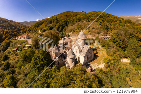 Aerial view of Medieval Haghartsin monastery complex 11th century on sunny summer day. Ancient church popular touristic destinations. Armenian attractions near Dilijan. Tavush Province, Armenia Europe Aerial view of Medieval Haghartsin monastery complex 11th century on sunny summer day. Ancient church popular touristic destinations. Armenian attractions near Dilijan. Tavush Province, Armenia Europe 121978994