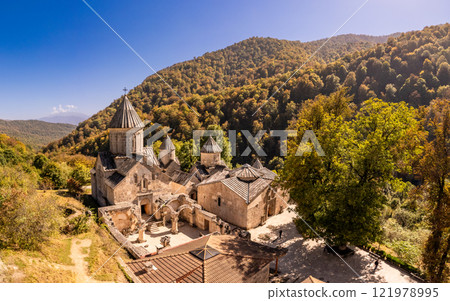 Aerial view of Medieval Haghartsin monastery complex 11th century on sunny summer day. Ancient church popular touristic destinations. Armenian attractions near Dilijan. Tavush Province, Armenia Europe Aerial view of Medieval Haghartsin monastery complex 11th century on sunny summer day. Ancient church popular touristic destinations. Armenian attractions near Dilijan. Tavush Province, Armenia Europe 121978995