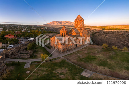 Aerial view of Hovhannavank monastery and Ohanavan village. Mount Ara, medieval church and Kasakh gorge and river canyon on sunny autumn sunset. Aragatsotn Province, Armenia. Europe. 121979008