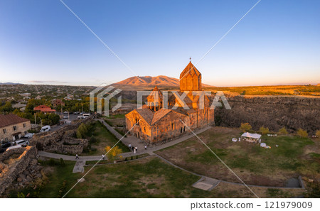 Aerial view of Hovhannavank monastery and Ohanavan village. Mount Ara, medieval church and Kasakh gorge and river canyon on sunny autumn sunset. Aragatsotn Province, Armenia. Europe. Aerial view of Hovhannavank monastery and Ohanavan village. Mount Ara, medieval church and Kasakh gorge and river canyon on sunny autumn sunset. Aragatsotn Province, Armenia. Europe. 121979009