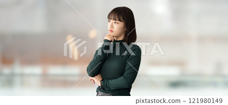 A young woman/businesswoman thinking A young woman/businesswoman thinking 121980149