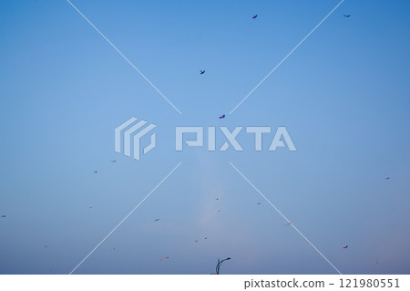Kids Flying Kites Under a Clear Sky Peaceful and Joyful Outdoor Scene. High quality photo 121980551