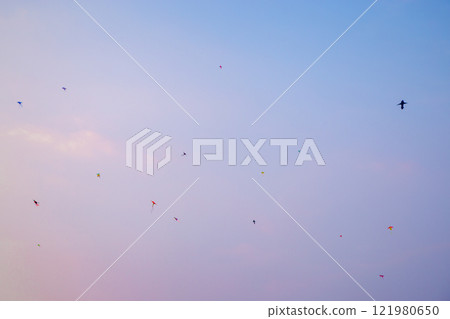 Kids Flying Kites Under a Clear Sky Peaceful and Joyful Outdoor Scene. High quality photo Kids Flying Kites Under a Clear Sky Peaceful and Joyful Outdoor Scene. High quality photo 121980650