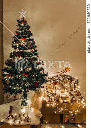 Handmade Wooden Christmas Nativity Scene with Lights and Pine Tree Festive Holiday Decor and Warm Wishes. High quality photo Handmade Wooden Christmas Nativity Scene with Lights and Pine Tree Festive Holiday Decor and Warm Wishes. High quality photo 121980710