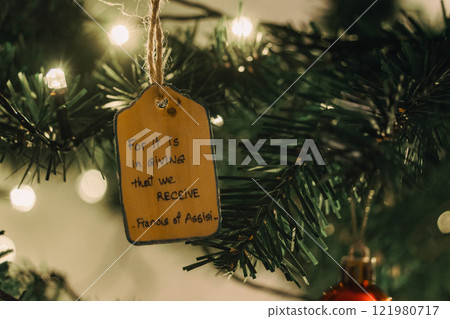 Handmade Wooden Christmas Nativity Scene with Lights and Pine Tree Festive Holiday Decor and Warm Wishes. High quality photo Handmade Wooden Christmas Nativity Scene with Lights and Pine Tree Festive Holiday Decor and Warm Wishes. High quality photo 121980717