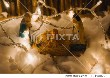 Handmade Wooden Christmas Nativity Scene with Lights and Pine Tree Festive Holiday Decor and Warm Wishes. High quality photo 121980729