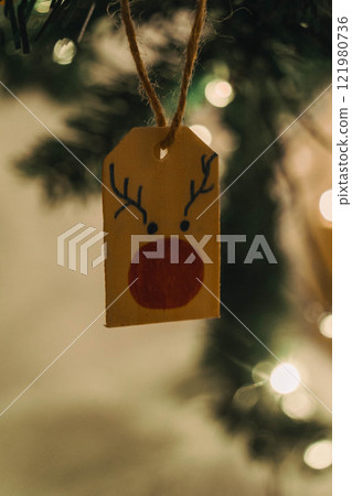 Handmade Wooden Christmas Nativity Scene with Lights and Pine Tree Festive Holiday Decor and Warm Wishes. High quality photo 121980736