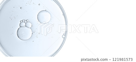 The texture of a cosmetic serum or body gel in a Petri dish. The texture of a cosmetic serum or body gel in a Petri dish. 121981573