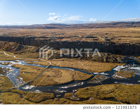 Aerial views reveal the breathtaking scenery of Tingvellir national park in Iceland, showcasing its remarkable natural beauty and unique geological features Aerial views reveal the breathtaking scenery of Tingvellir national park in Iceland, showcasing its remarkable natural beauty and unique geological features 121981873