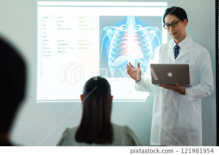 Doctor presenting research Doctor presenting research 121981954