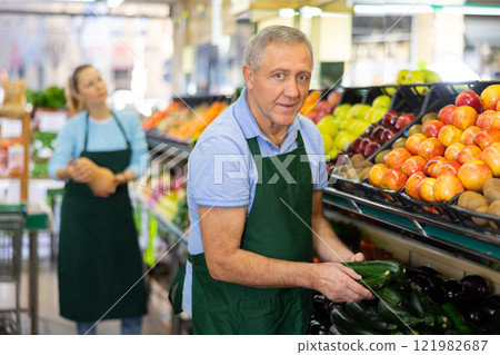 man seller offers to buy zucchini man seller offers to buy zucchini 121982687