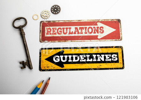 Regulations and Guidelines. Red and yellow directional arrow with text Regulations and Guidelines. Red and yellow directional arrow with text 121983106