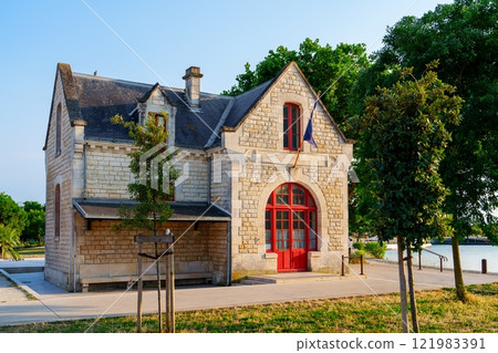 Charming Stone Building with Red Door Near Water in France, La rochelle Charming Stone Building with Red Door Near Water in France, La rochelle 121983391