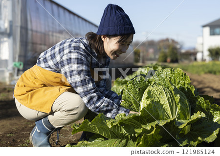 Scene of farmers working in the fields Scene of farmers working in the fields 121985124
