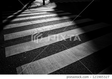 A crosswalk illuminated by low sunlight A-5 Monochrome A crosswalk illuminated by low sunlight A-5 Monochrome 121985327