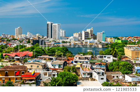 Skyline of Cartagena de Indias, Colombia, a blend of modern and old architecture, and contrasting rich and poor districts Skyline of Cartagena de Indias, Colombia, a blend of modern and old architecture, and contrasting rich and poor districts 121985533