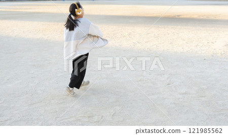Elementary school girls playing outside 121985562