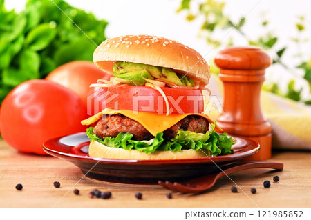Homemade hamburger, cheese tomato avocado hamburger, cheeseburger, hamburger image 121985852