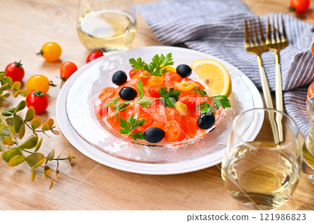 Salmon carpaccio, carpaccio salad, salmon and cherry tomato carpaccio, Italian Salmon carpaccio, carpaccio salad, salmon and cherry tomato carpaccio, Italian 121986823