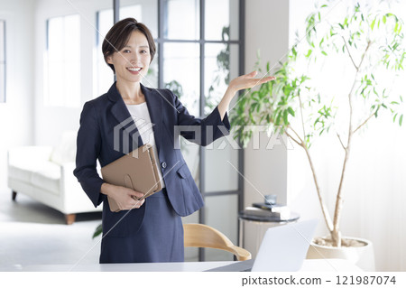 Portrait of a woman in a business suit 121987074