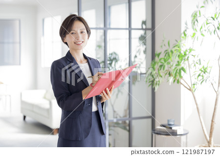 Portrait of a woman in a business suit 121987197