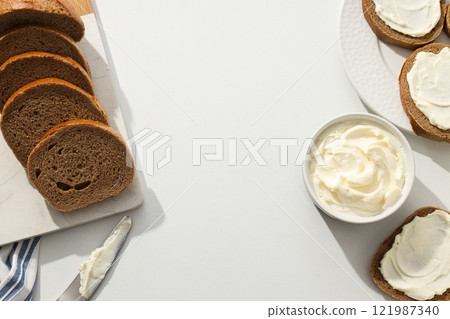 Sandwiches with Philadelphia cheese on a light background. 121987340