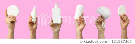 Bathroom accessories, set of hands with bathroom accessories on pink background 121987365